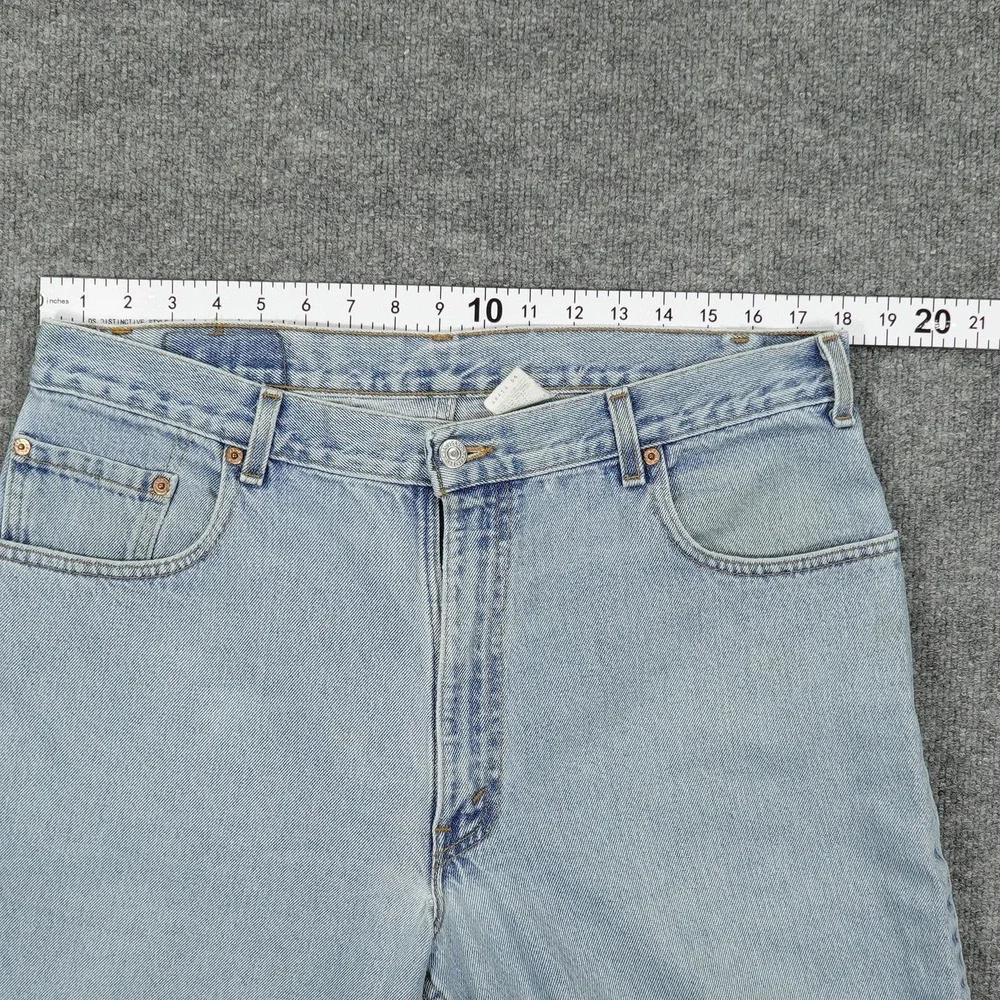 Vintage Levis 560 Jeans Mens 36x26 Light Wash Blue Relaxed Tapered Raw Hem